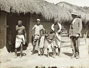 Missionary and villagers, India, ca. 1925