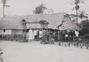 Miss Godfrey with a patient at Ama Achara dispensary, Nigeria, 1922