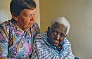 Bushangaro, Karagwe Diocese, Tanzania. DMS Missionary Gudrun Vest with Maria, one of the two ol