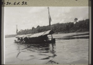 A non-christian dayak being taken to the village of his bride for the wedding