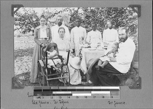 Missionaries at coffee table, Kyimbila, Tanzania, ca. 1903-1914