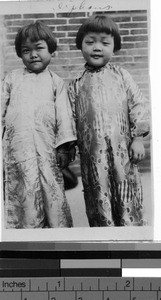 Two young orphan girls, Loting, China, ca. 1930