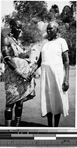 Two women shaking hands, Africa, October 1949