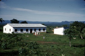 Women and children going towards the school, Mbe, Adamaoua, Cameroon, 1953-1968