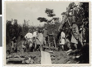 Trial run of the first flour mill of the mission station, Ayra, Ethiopia