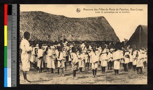 Schoolchildren exercising outdoors, Congo, ca.1920-1940