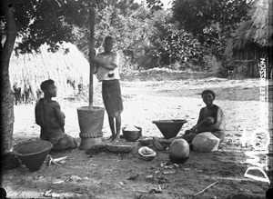 African women preparing food, Antioka, Mozambique, 1906