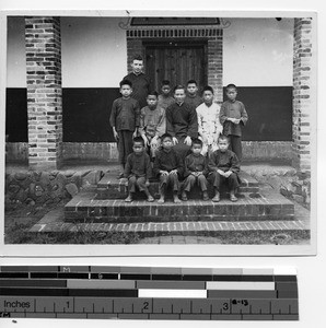 Fr. Arthur Dempsey with class of boys in Wuzhou, China, 1933