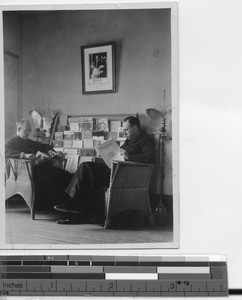 Maryknoll priests in waiting room at Andong, China, 1930