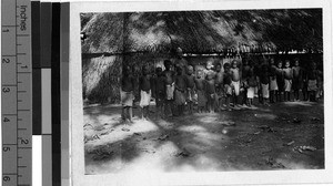 Group of children outside a building, Solomon Islands, Oceania, 1943