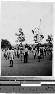 Boys in formation with a band and flags, Africa, February 19, 1947