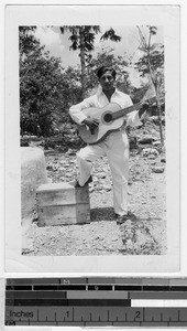 Portrait of a man playing the guitar, Quintana Roo, Mexico, ca. 1947