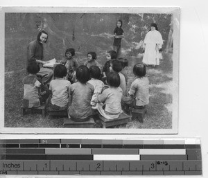 An open air catechism class at Jiangmen, China, 1947