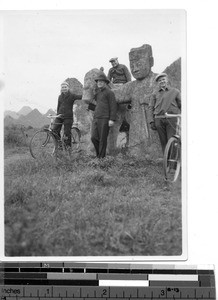 Four men at Monument near Ming Tombs at Guilin, China, 1930