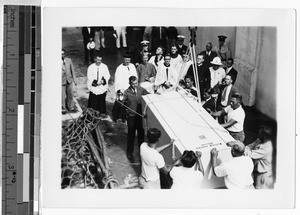 Lifting Father Damien's coffin aboard U.S.A.T. Republic, Hawaii, 1936