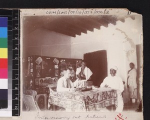 Medical missionary with out patients, possibly at the Ralph Wardlaw Thompson Hospital, Chikballapur, Karnataka, India, ca.1912-1920