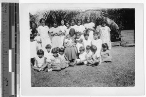 Sr. M. Natalie King, MM, sitting with orphans at Maui Children's Home, Wailuku, Hawaii, June 1934