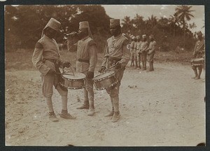 Askaris with drums and a trumpet, Tanzania, ca.1900-1914