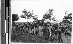 Large crowd of people walking, Africa, ca. 1920-1940