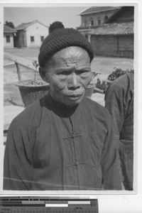 The gate keeper at the mission at Pingnan, China, 1934