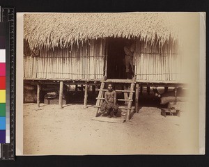 Woman sitting on steps of house, Papua New Guinea, ca.1884