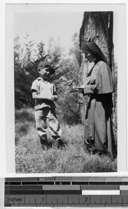 Sister Leona Michiels, MM, with boy at summer cottage at Kula, Hawaii, ca. 1930-1950