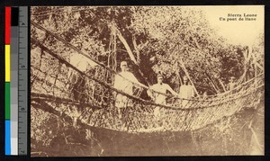 Four men on a woven rope bridge, Sierra Leone, ca.1920-1940