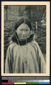 Girl wearing a crucifix, Alaska, ca.1920-1940