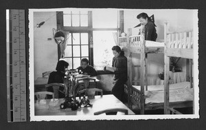 Bunk beds in dorm, Chengdu, Sichuan, China, 1943