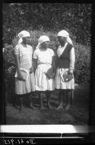 African girls carrying books, Maputo, Mozambique, 1932