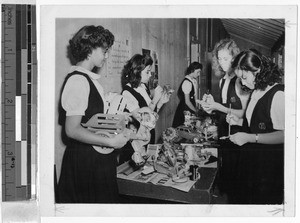 Maryknoll School Sodalists making toys for orphans, Punahou, Honolulu, Hawaii, ca. 1944