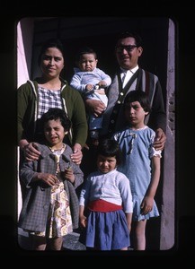 Family outside their home