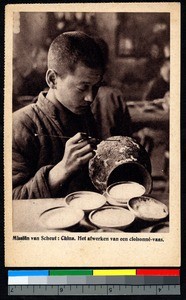 Finishing a cloisonné vase, China, ca.1920-1940