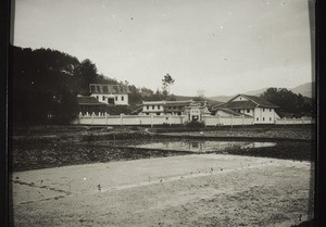 Mission station Hoschuwan seen from the south. The mission house is on the extreme left, fairly dark