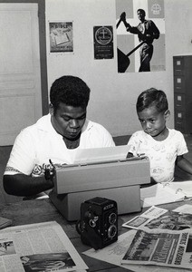 Mr Kaen Ihage, the administrative assistant of the Evangelical Church of New Caledonia, at his desk