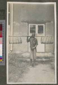 Carrying goods to market, Malawi, ca.1926