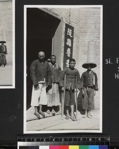 Group of patients at entrance of Methodist Mission compound and hospital, Suixian, China, ca. 1937