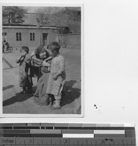 Maryknoll Sister at orphanage at Fushun, China, 1938