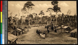 People walking through a forest village, Congo, ca.1920-1940