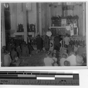 Father Maynard Murphy celebrating a marriage ceremony at Beitouzhai, China, 1931