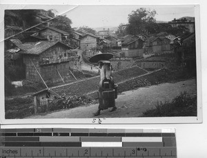 A water carrier at Wuzhou, China, 1935