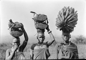 Women carrying fruits on their heads, Tanzania, ca.1893-1920