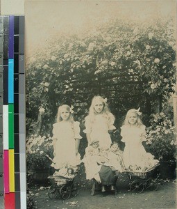 Three missionary daughters playing with their dolls, Madagascar, ca.1906