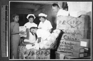 Unpacking medical supplies, Jinan, Shandong, China, 1941