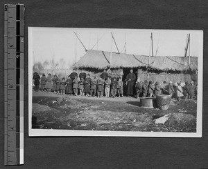 Children in line for food at famine refugee camp, Jinan, Shandong, China, ca.1927-1928