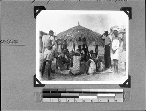 Group of young people playing a spinning top game, Nyasa, Tanzania, 1936