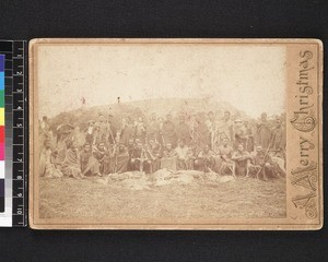 Portrait of men with animals killed on hunt, Africa, s.d