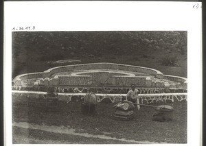 A large horse-shoe shaped grave