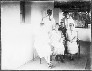 The Blumer and von Witten families on a porch, Engare Narok, Tanzania, 1926