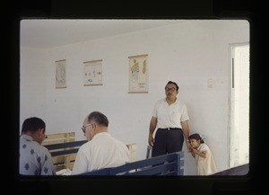 man with a girl in a classroom or church